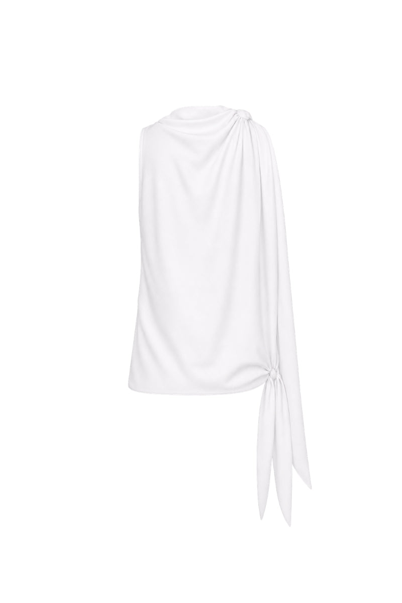 White pearl Lumara blouse by Tinta Latina, stylish and elegant top with a relaxed fit and subtle pearl accents.