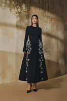 L'SCARLETT flared long-sleeve maxi dress with 3D crystal floral embellishments, elegant and flowing for special occasions.