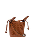 ISIDORA MALVA La Dorada Mini brown top handle bag with structured design and sleek finish on smooth leather surface.