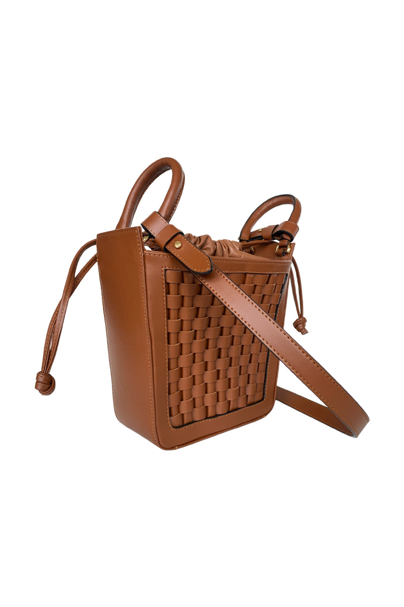 ISIDORA MALVA La Dorada Mini brown top handle bag with sleek design and compact size, featuring a stylish brown leather finish.
