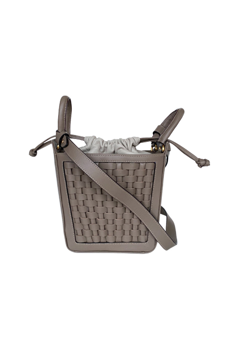 ISIDORA MALVA La Dorada Mini taupe top handle bag with sleek design and compact size, featuring a structured silhouette and top handle.