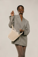 ISIDORA MALVA La Dorada mini tote bag in ivory with top handle and sleek design, perfect for stylish everyday use.