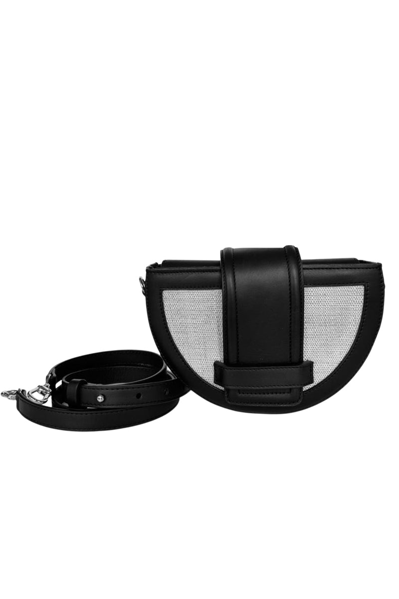 Black ISIDORA MALVA Luna clutch with sleek design, featuring a smooth exterior and elegant shape for stylish occasions.