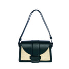 Black ISIDORA MALVA La Pradera shoulder bag with soft fiber material and adjustable strap, stylish and functional for everyday use.