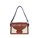 ISIDORA MALVA La Pradera shoulder bag in tan leather with adjustable shoulder strap and stylish design.
