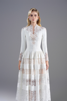 White lace high-neck midi dress by ROSEE DE MATIN featuring intricate lace details and a fitted silhouette.