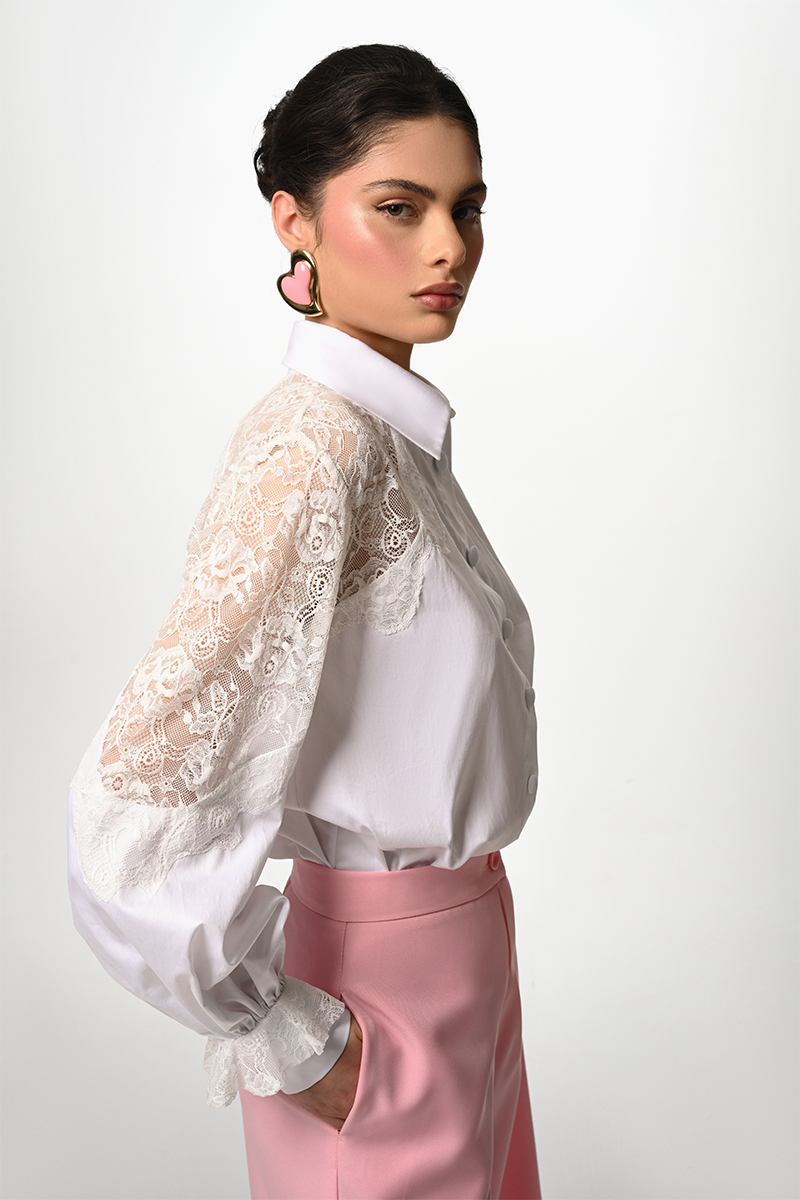 White Liya Lace Reverie Shirt made of delicate lace fabric, featuring a classic button-up design and elegant long sleeves.