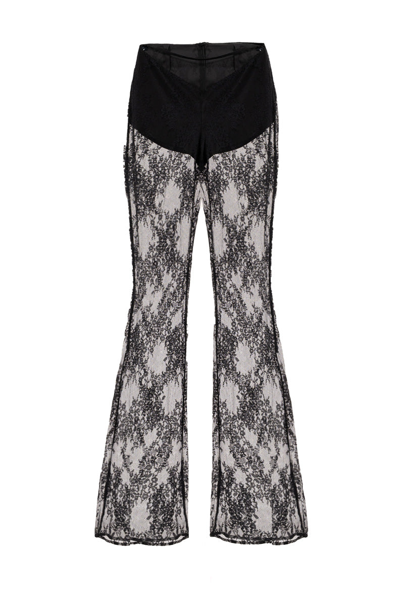 Black Kris Marán laced pants with stylish cutout details, showcasing a trendy and edgy fashion look.