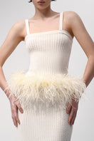 Cream ribbed feather knit midi skirt by Lalo featuring a textured, fitted design perfect for stylish casual wear.