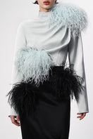 Black Lalo pencil skirt with feather details, midi length, stylish and elegant for chic fashion looks