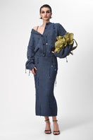 Blue hand-knit pencil skirt with embellishments from Lalo featuring a maxi skirt design and intricate knit details.