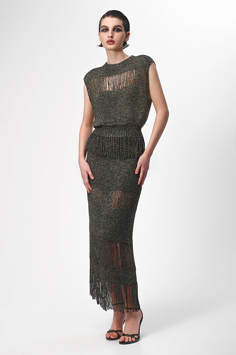 Lalo hand-knit metallic vest with embellishments, showcasing a stylish tops design in a close-up shot.