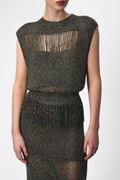 Lalo hand-knit metallic maxi skirt with embellishments, featuring a flowing design and intricate detailing.