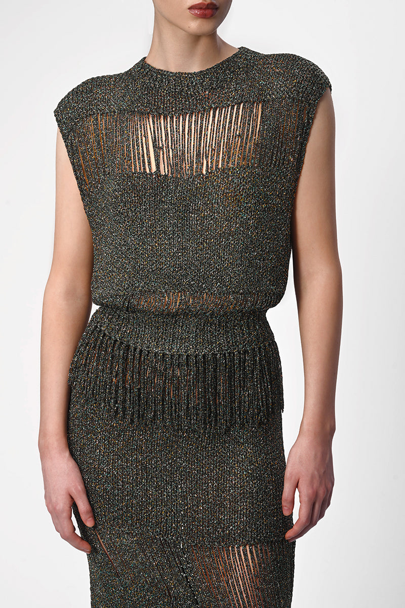Lalo hand-knit metallic maxi skirt with embellishments, featuring a flowing design and intricate detailing.