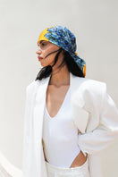 Amel Batita Lalut silk scarf featuring a 90 cm model bandana in vibrant colors, stylish accessory for any outfit