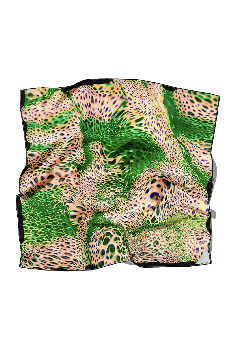 Amel Batita Lamazon Moussard silk scarf featuring vibrant floral patterns and elegant drape on a neutral background.