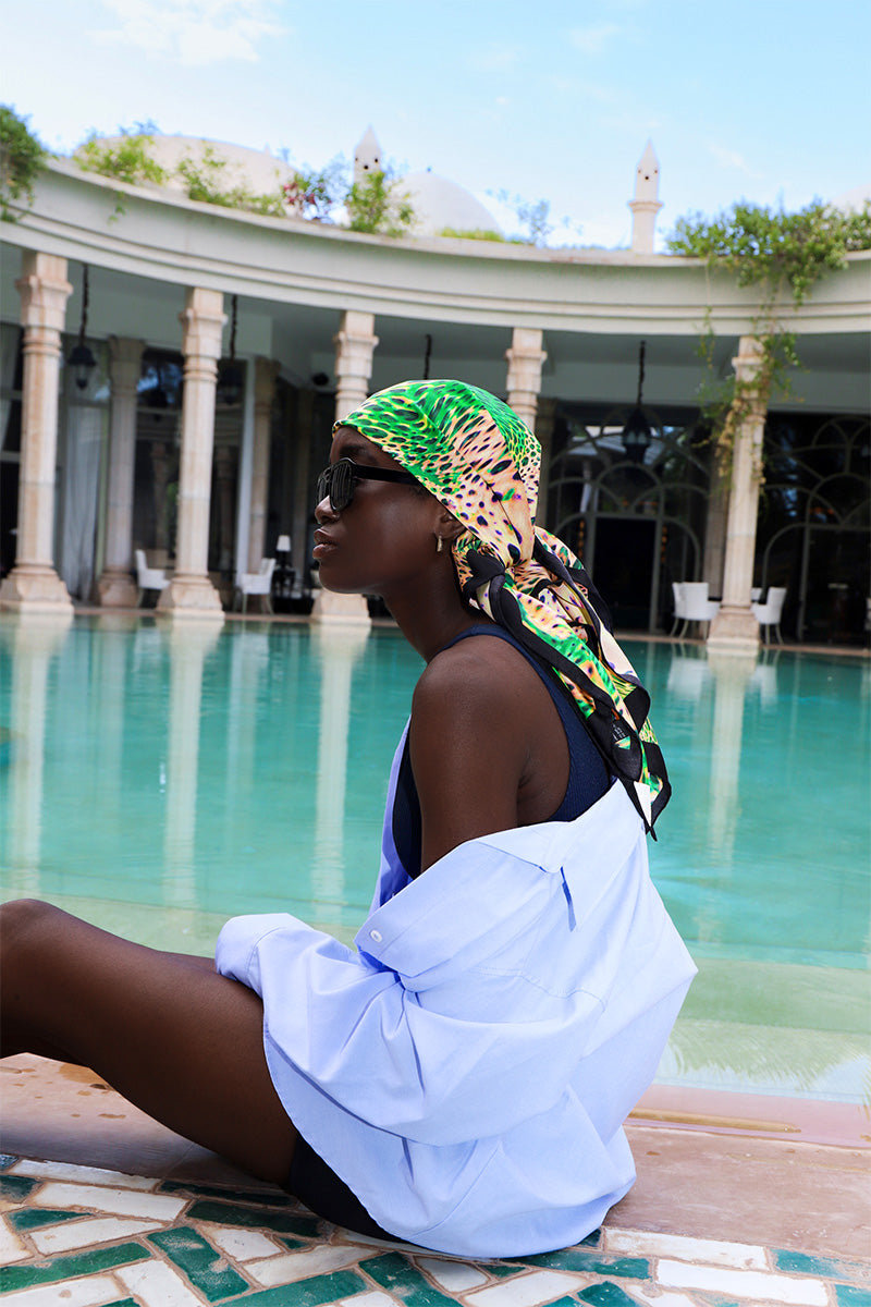 Amel Batita Lamazon Moussard silk scarf featuring a 90cm bandana design with intricate patterns and vibrant colors.