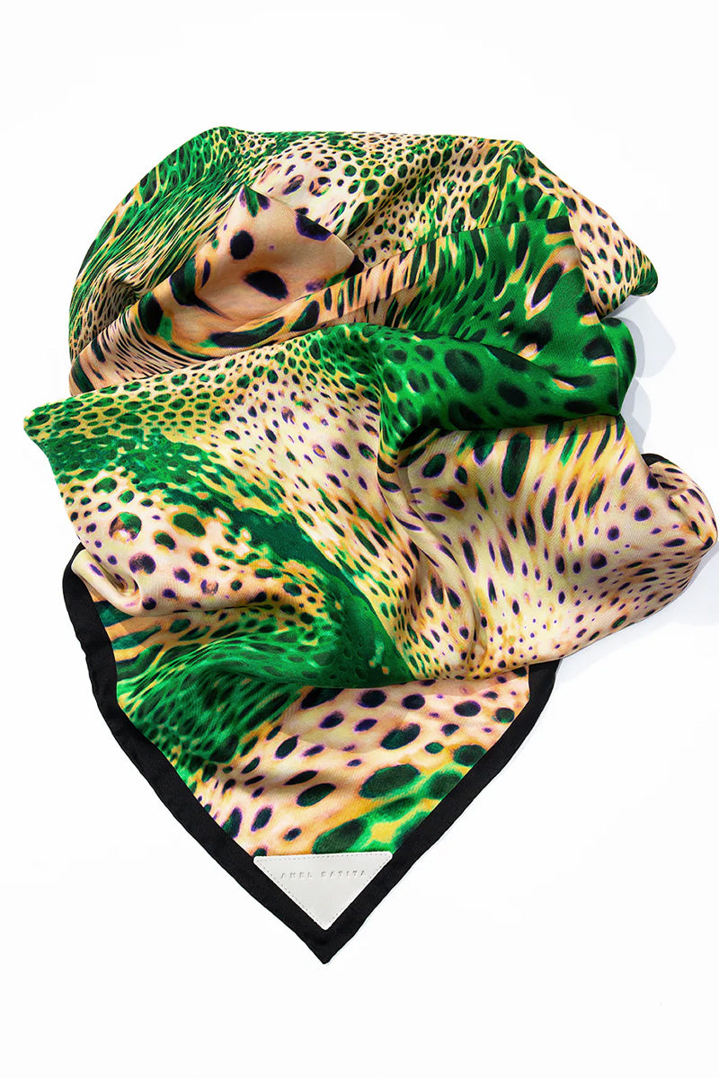 Amel Batita Lamazon Moussard silk scarf featuring intricate patterns and vibrant colors, styled as a luxurious accessory.