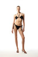 Black L’AMOUR bikini set by Maliluha featuring a stylish two-piece swimwear with a flattering fit and adjustable straps.