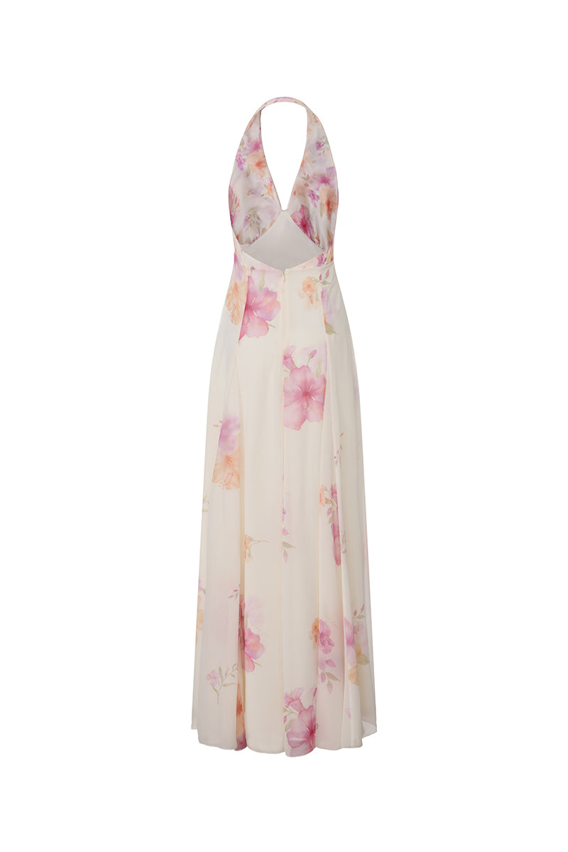 Beige floral Lana halter maxi dress by Nana Jacqueline, shown from the back with flowing fabric and elegant design.