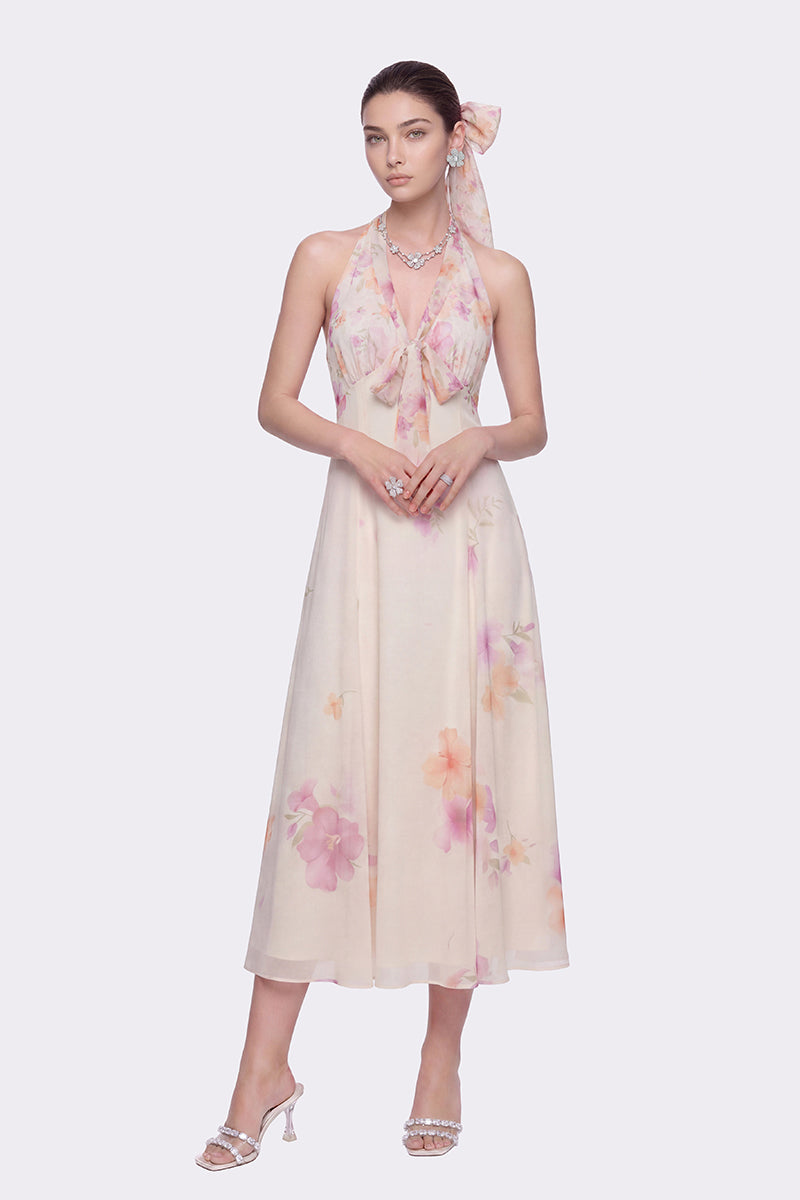 Beige floral Lana halter maxi dress by Nana Jacqueline, featuring a flowing silhouette and elegant floral pattern.