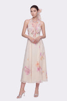 Beige floral Lana maxi dress with halter neckline by Nana Jacqueline, featuring elegant flowing fabric and summer-inspired design.