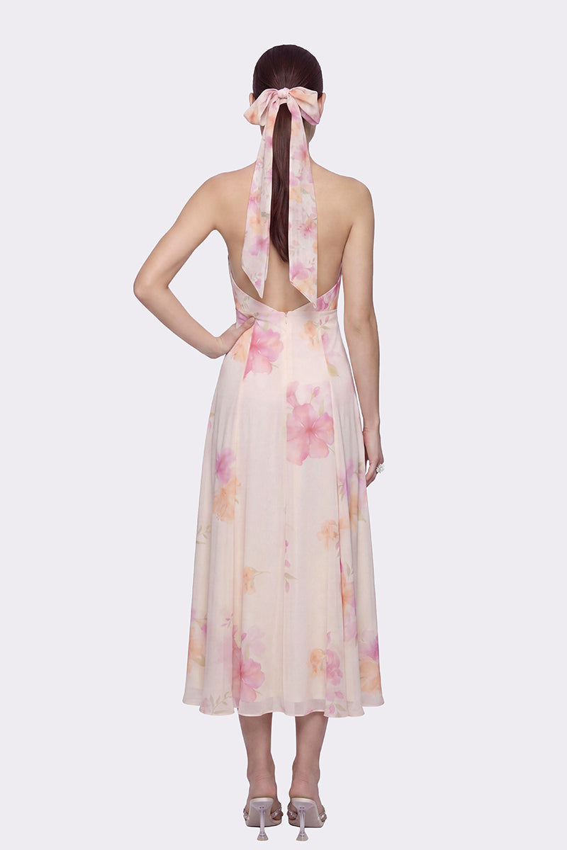 Beige floral Lana maxi dress by Nana Jacqueline featuring a halter neckline and elegant flowing fabric.