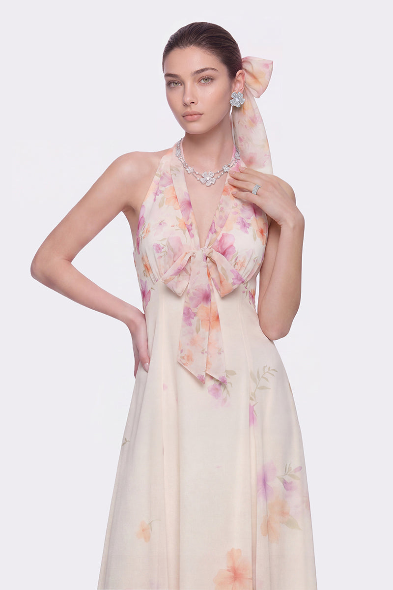 Beige floral Lana maxi dress by Nana Jacqueline featuring a halter neckline and elegant flowy design.