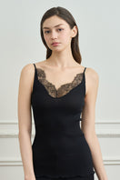 Black knit camisole for women by MANITO, showing a close-up of the stylish, comfortable top with a scoop neckline.
