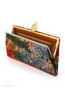 Multicolor leaf-patterned clutch from Sarah's Bag's Lean on Autumn Field Grace collection, featuring a stylish, compact design.