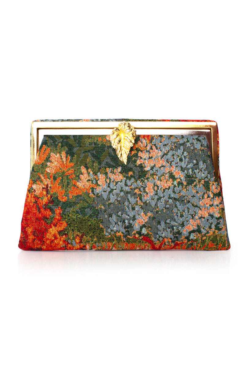 Multicolor Sarah's Bag LEAN ON AUTUMN FIELD GRACE clutch with leaf and floral design, featuring a textured fabric surface.