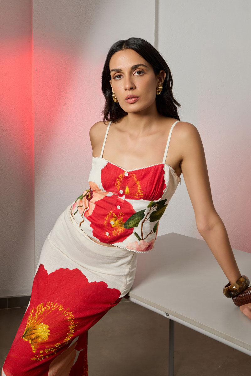 Maxi skirt by Summer Away in a wild bouquet floral print, flowing design with a high waist and vibrant colors.