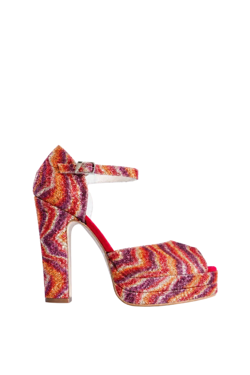 Terry de Havilland Lena Lava Red glitter heels with pointed toes and ankle straps, featuring bold red color and sparkling design.