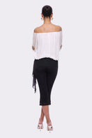 White Leona Top by Nana Jacqueline featuring a stylish ring cutout design, perfect for trendy casual or dressy outfits.