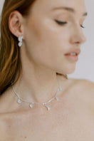 Silver petite moon necklace from Freya Rose's WARRIORESS collection, featuring a delicate moon pendant on a fine chain.