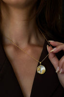 Gold-plated Scorpio zodiac necklace by Freya Rose displayed with a chain and zodiac pendant, styled for everyday wear.