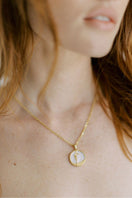 Gold plated Virgo zodiac necklace by Freya Rose, featuring a pendant with the Virgo symbol on a delicate chain.