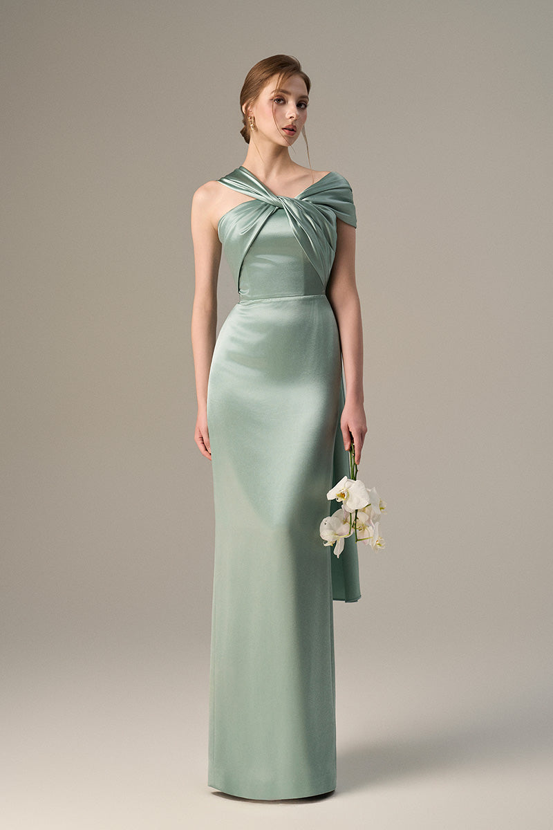 Light green satin silk maxi dress with twisted cross detail and pleated drape by I.H.F. stylish and elegant evening wear.