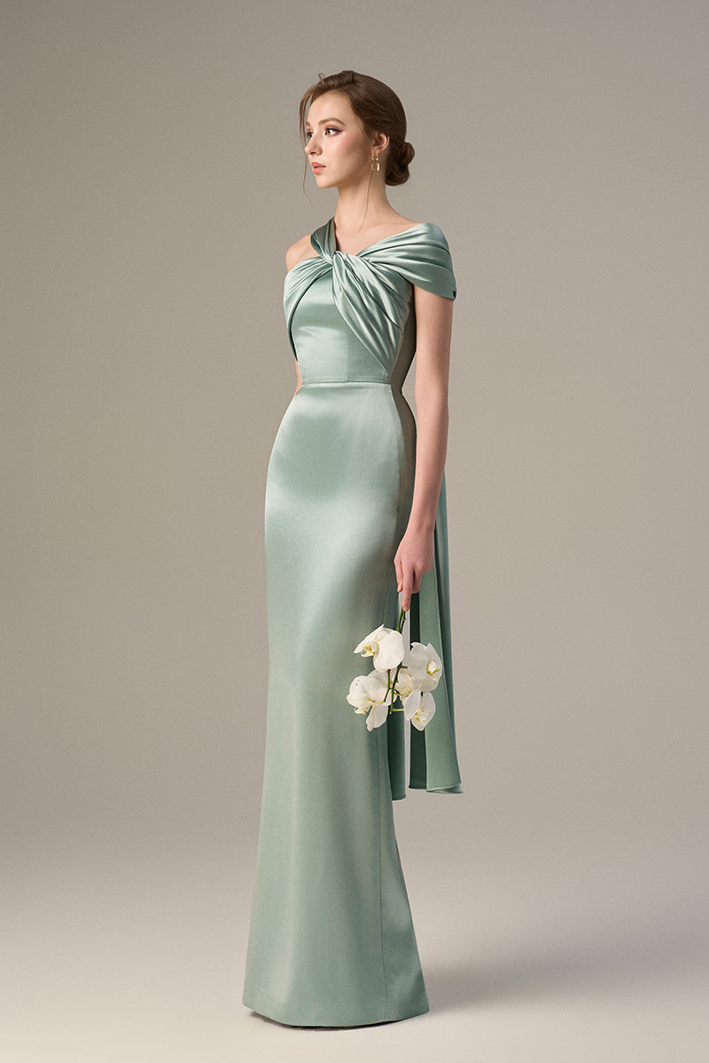 Light green satin silk maxi dress with twisted cross detail and pleated drape by I.H.F, elegant evening wear with a flowing silhouette.
