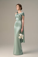 Light green satin silk gown by I.H.F featuring a twisted cross design and pleated drape, elegant and flowing for special occasions.