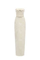 Light yellow strapless lacquered brocade gown by I.H.F Studio with pearl and crystal chain embellishments, elegant column style.