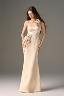 Beige one-shoulder gown made of light yellow taffeta with rosette detail, designed by I.H.F Studio.