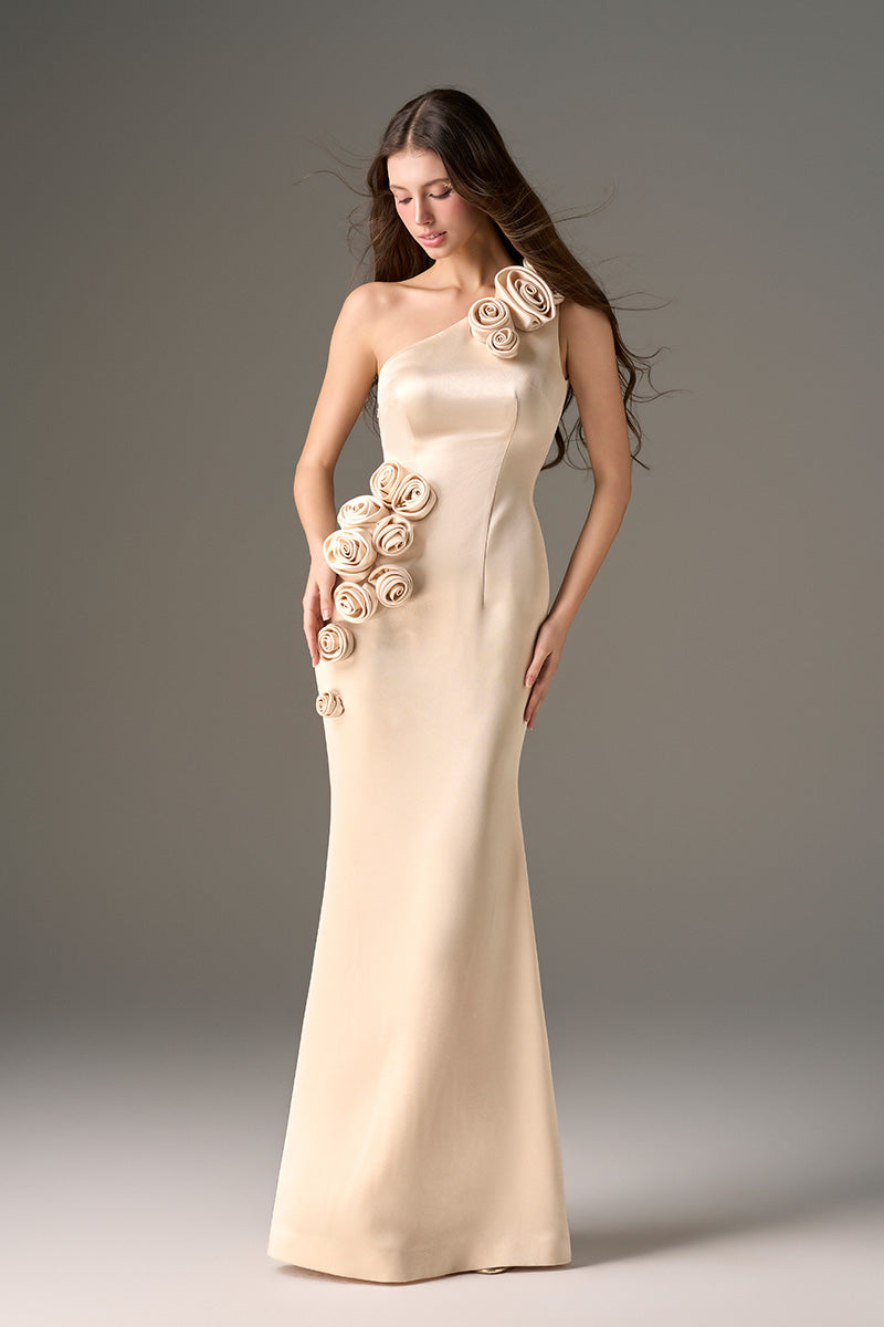 Beige one-shoulder gown made of light yellow taffeta with rosette detail, designed by I.H.F Studio.