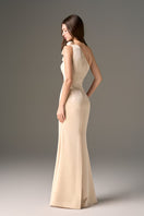 Beige one-shoulder taffeta gown with rosette detail by I.H.F Studio, featuring a light yellow hue and elegant maxi length.