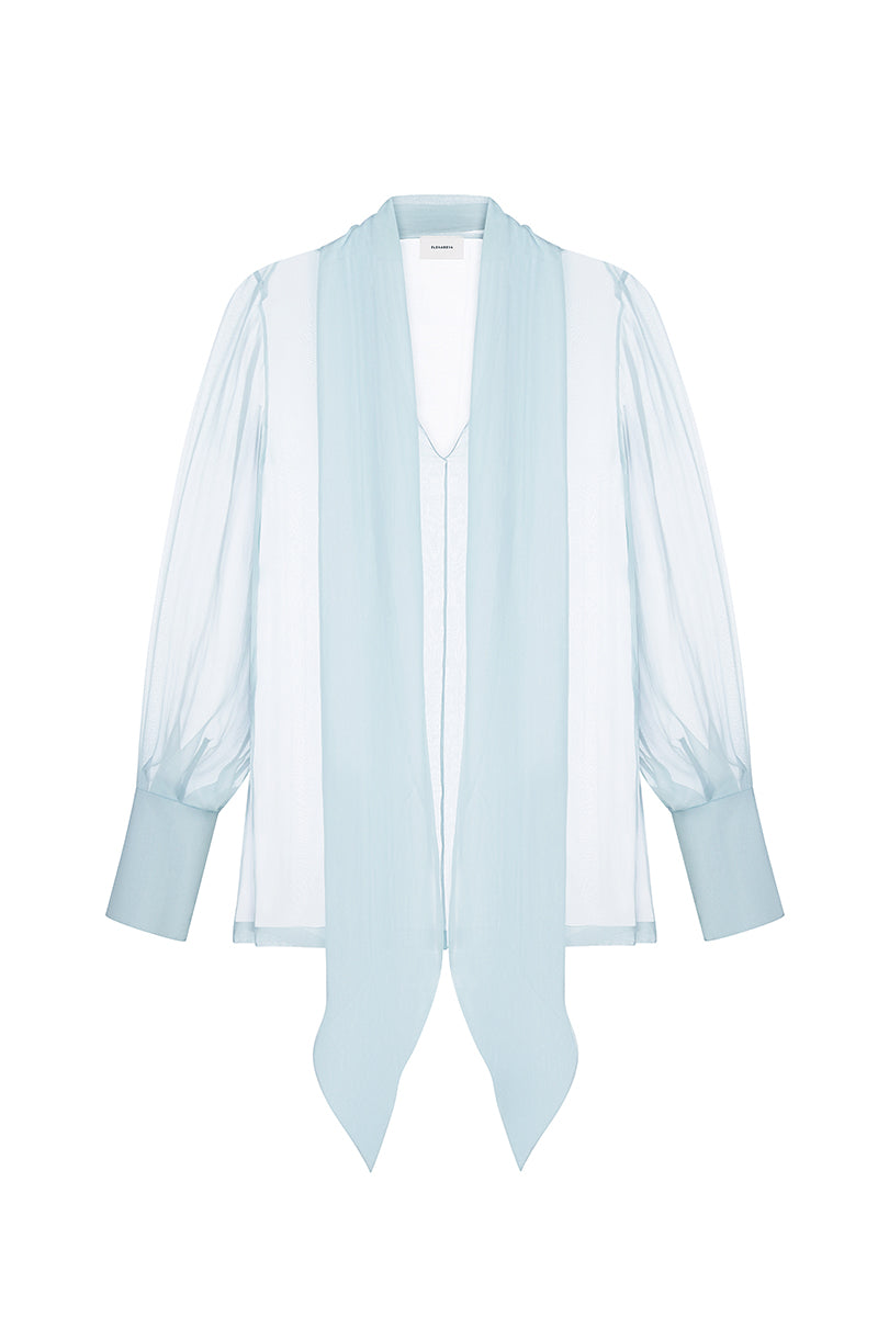 Light blue chiffon blouse with a scarf from ELENAREVA, featuring a flowy fabric and stylish design, worn by a model.