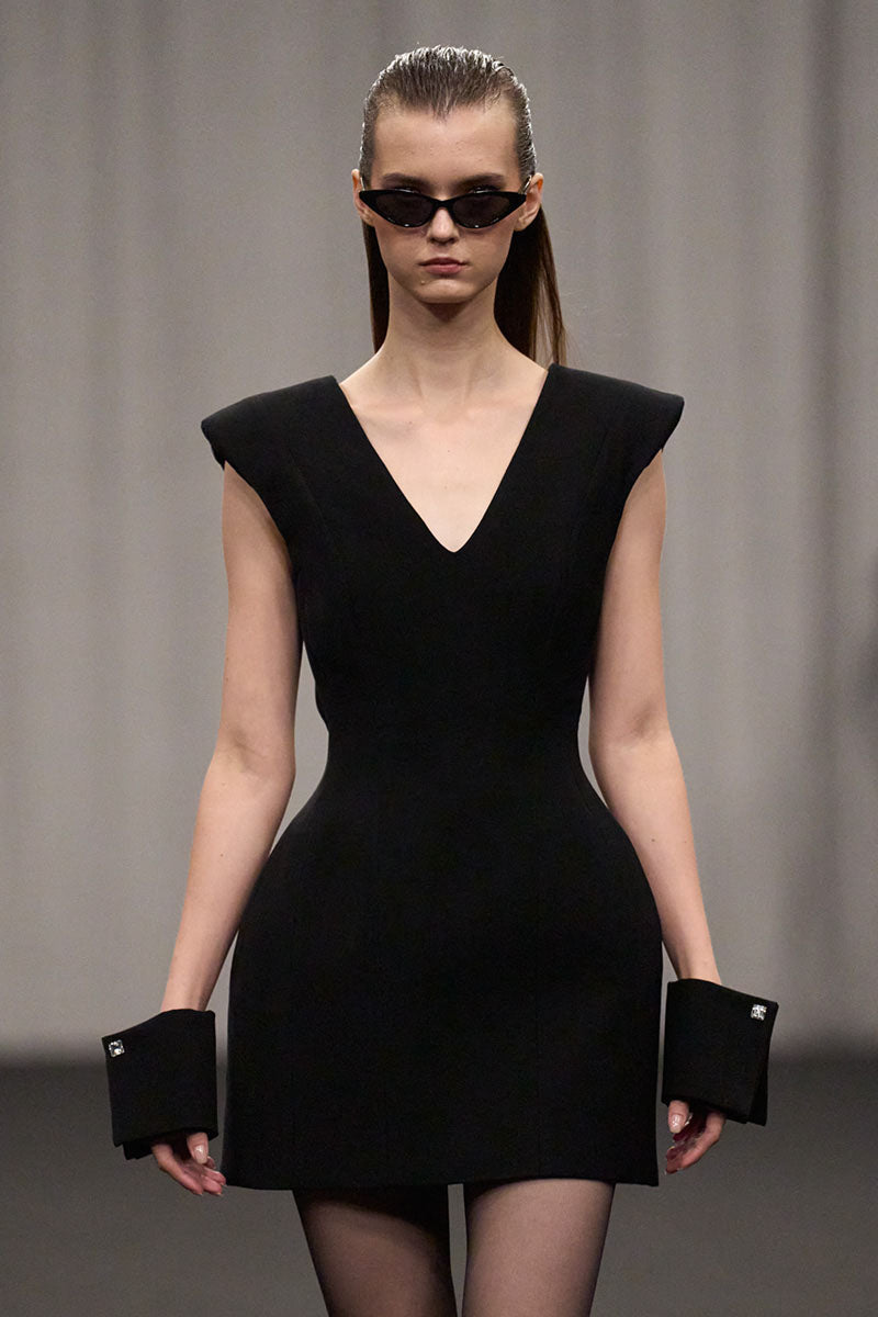 Lili Blanc luxe tailored sleeveless midi dress with fitted bodice and flowing skirt, stylish for elegant occasions.