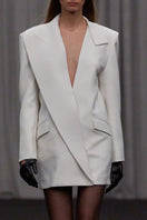 Lili Blanc contemporary straight-cut blazer-inspired dress in neutral fabric, displayed on a hanger.