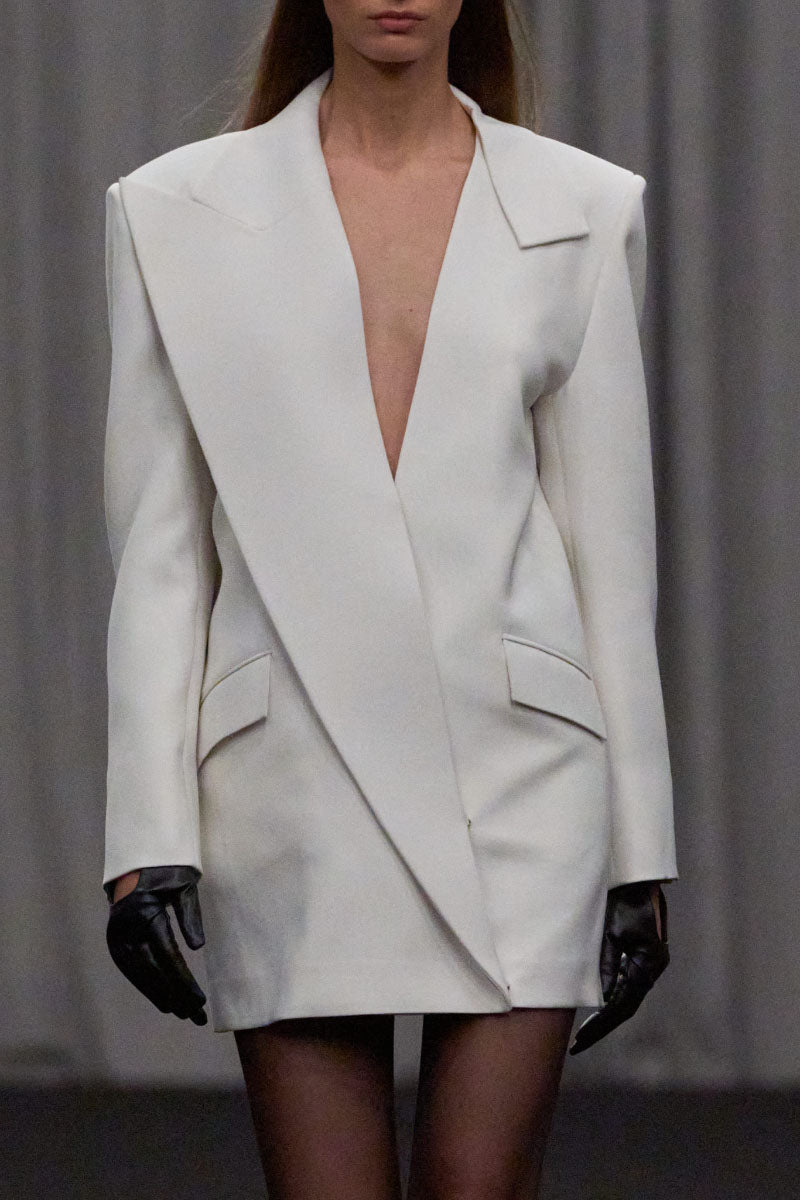 Lili Blanc contemporary straight-cut blazer-inspired dress in neutral fabric, displayed on a hanger.