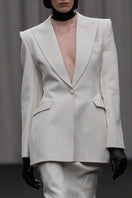 Lili Blanc sleek single-breasted blazer in classic design, shown in black with tailored fit and structured lapels.
