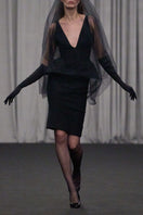 Lili Blanc sleeveless tailored midi dress with a sophisticated fit, perfect for elegant occasions, shown on a model.